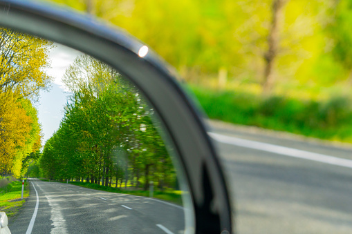  the rear view mirror inside a car